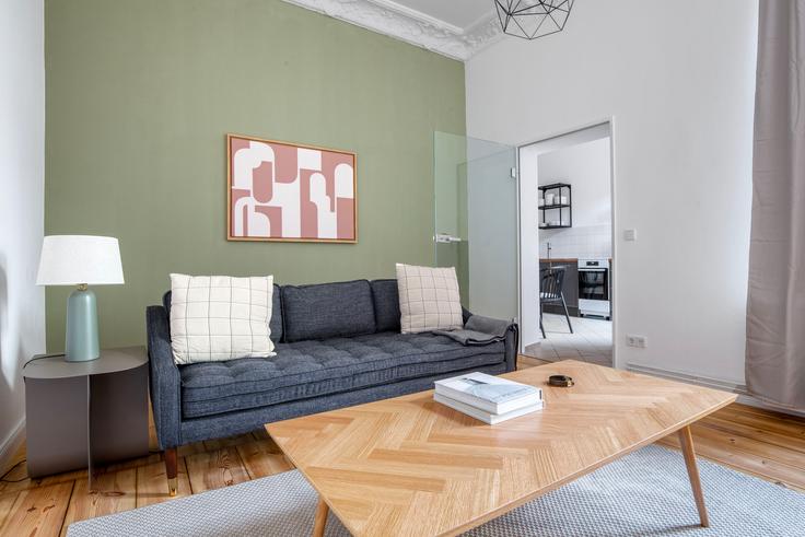 Elegantly designed living room with modern furnishings in an apartment at Stargarder in Prenzlauer Berg, Berlin