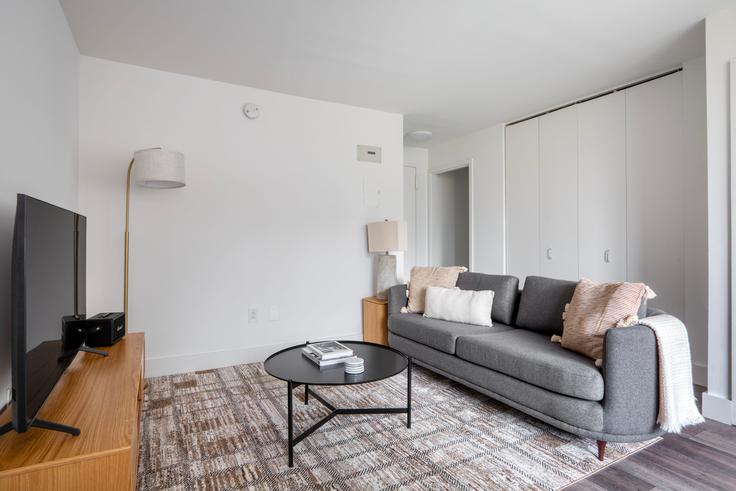 Elegantly designed living room with modern furnishings in an apartment at 500 Second Avenue in Kips Bay, New York