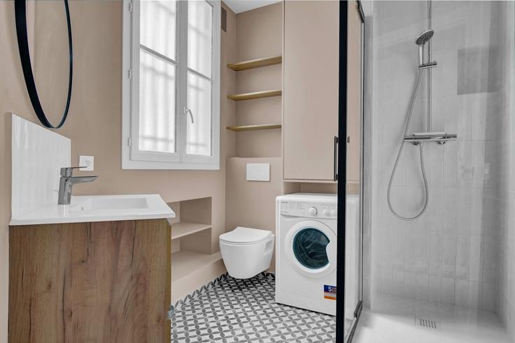 Refined and beautifully designed bathroom with sophisticated touches at Maubeuge 82 in 9th arrondissement, Paris
