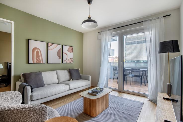 Elegantly designed living room with modern furnishings in an apartment at Kay Stiege 1 in 20th district - Brigittenau, Vienna