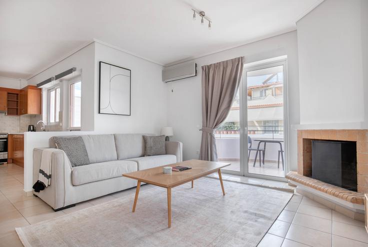 Chic living room with minimalist design from a furnished apartment in Agia Paraskevi, Athens