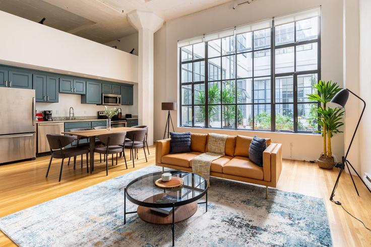 Elegantly designed living room with modern furnishings in an apartment at 601 4th street in San Francisco, San Francisco