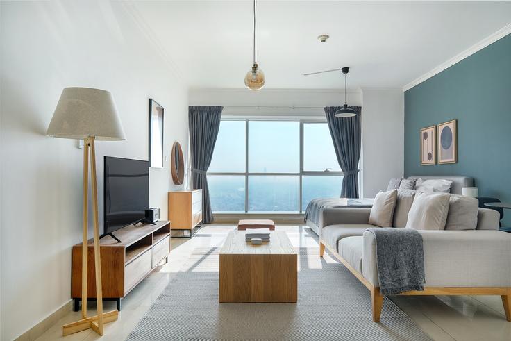 Salle de séjour élégante avec mobilier moderne dans un appartement à Saba tower à JLT, Dubai Salle de séjour élégante avec mobilier moderne dans un appartement à Saba tower à JLT, Dubai