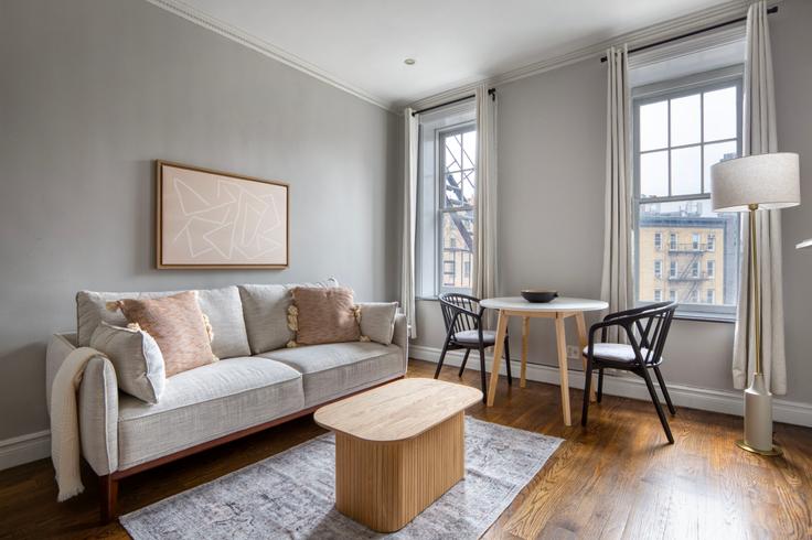 Elegantly designed living room with modern furnishings in an apartment at 51 Leroy Street in West Village, New York