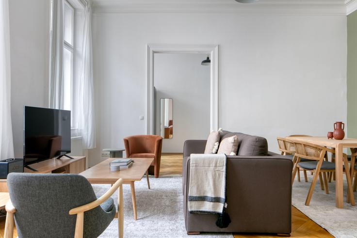 Elegantly designed living room with modern furnishings in an apartment at Spiegelgasse 8 in 1st district – Innere Stadt, Vienna