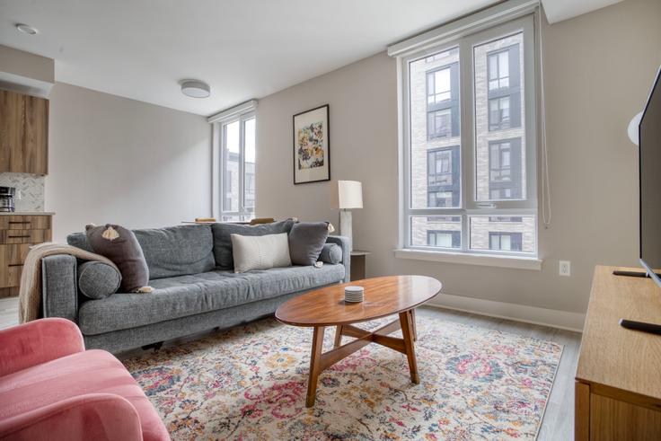 Elegantly designed living room with modern furnishings in an apartment at 44 Banner Lane in NoMa, Washington D.C.