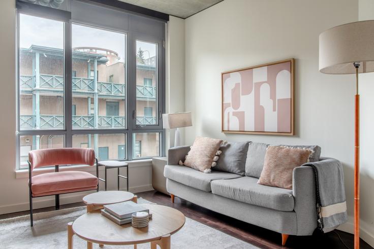 Elegantly designed living room with modern furnishings in an apartment at 624 Yale in South Lake Union, Seattle