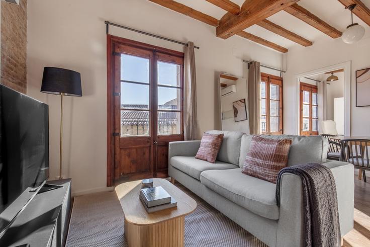 Elegantly designed living room with modern furnishings in an apartment at Rec Comtal 15 in El Born, Barcelona