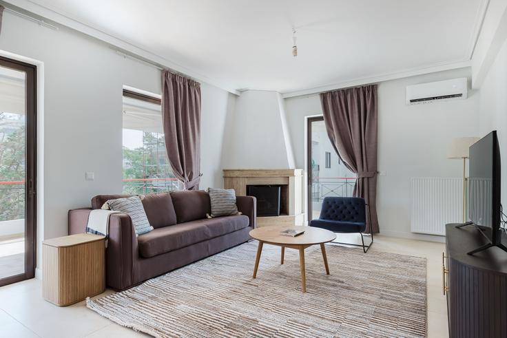 Elegant gestaltetes Wohnzimmer mit moderner Einrichtung in einer Wohnung im Gkionas I in North Athens, Athens Elegant gestaltetes Wohnzimmer mit moderner Einrichtung in einer Wohnung im Gkionas I in North Athens, Athens