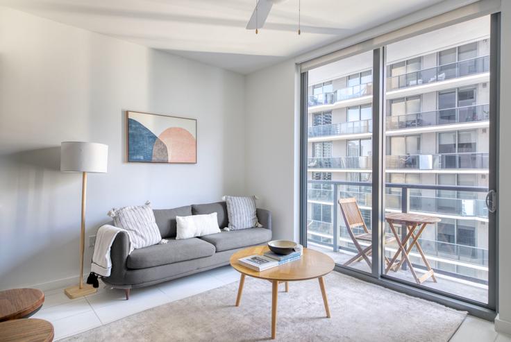 Elegantly designed living room with modern furnishings in an apartment at Solitair Brickell in Brickell, Miami