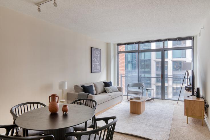 Elegantly designed living room with modern furnishings in an apartment at Seventy Yards in Navy Yard, Washington D.C.