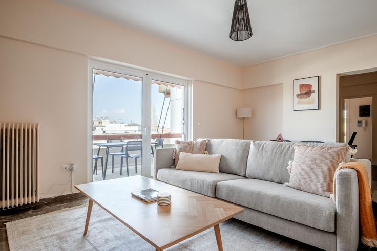 Chic living room with minimalist design from a furnished apartment in Chalandri, Athens