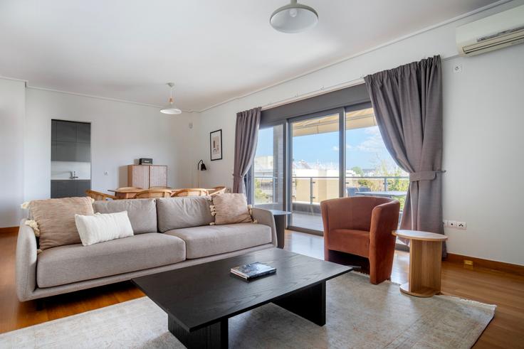 Elegantly designed living room with modern furnishings in an apartment at e8fe594d-02fb-49c4-8926-cff59aa56008 in Vrilissia, Athens