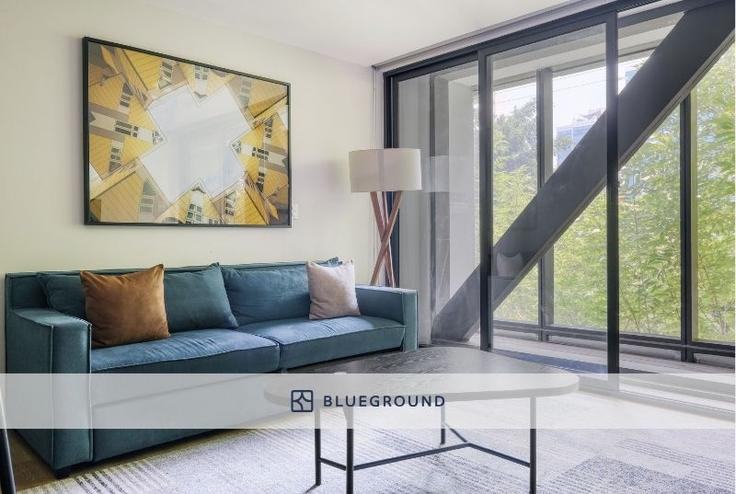 Elegantly designed living room with modern furnishings in an apartment at Insurgentes 432 in Roma Sur, Mexico City