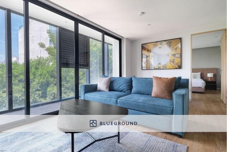 Salle de séjour élégante avec mobilier moderne dans un appartement à Insurgentes 432 à Mexico City, Mexico City