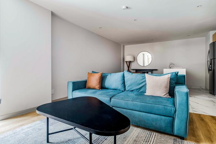 Elegantly designed living room with modern furnishings in an apartment at Insurgentes 432 in Roma Sur, Mexico City