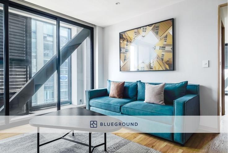 Elegantly designed living room with modern furnishings in an apartment at Insurgentes 432 in Roma Sur, Mexico City