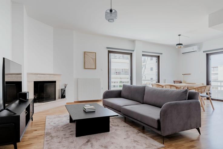 Chic living room with minimalist design from a furnished apartment in Glyfada, Athens