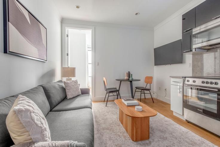 Elegantly designed living room with modern furnishings in an apartment at 1290 1st Ave in Upper East Side, New York