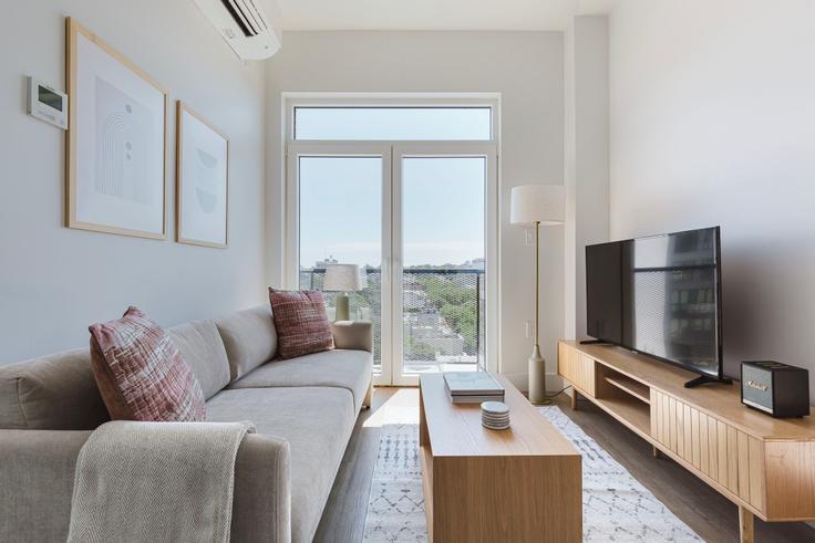 Elegantly designed living room with modern furnishings in an apartment at 82 Fourth Avenue in Boerum Hill, New York