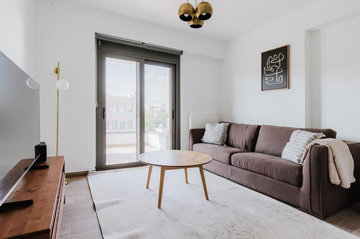 Elegantly designed living room with modern furnishings in an apartment at Menelaou 3 Palaio Faliro in Palaio Faliro, Athens