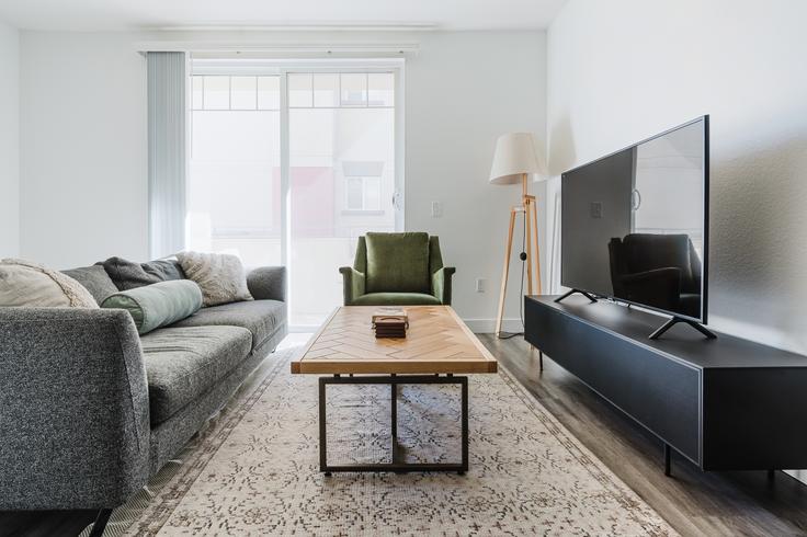 Elegantly designed living room with modern furnishings in an apartment at Gema in Gaslamp, San Diego