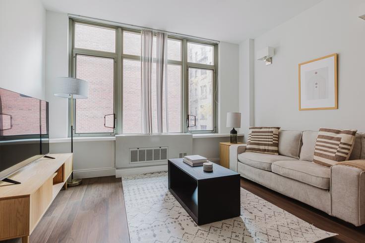 Elegantly designed living room with modern furnishings in an apartment at 266 3rd Avenue in Gramercy Park, New York