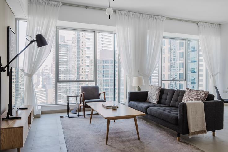 Elegantly designed living room with modern furnishings in an apartment at Marina promenade in Marina Promenade - Attessa Tower, Dubai