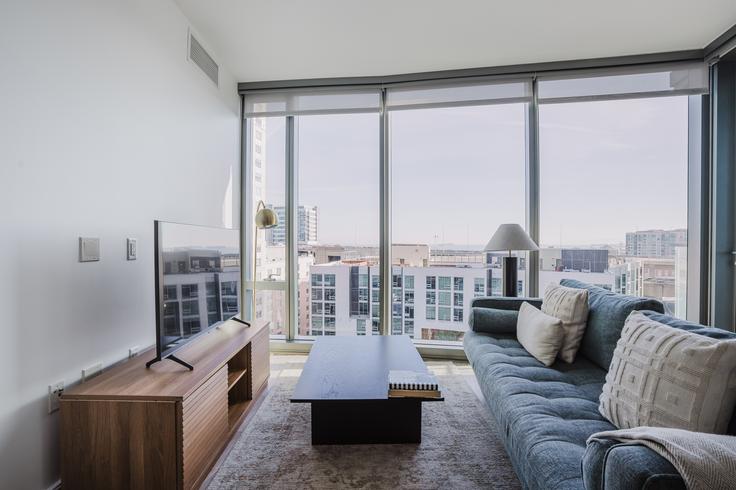 Elegantly designed living room with modern furnishings in an apartment at 399 Fremont in Rincon Hill, San Francisco Bay Area