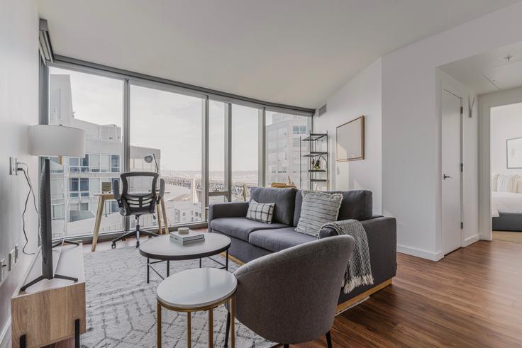 Elegantly designed living room with modern furnishings in an apartment at 399 Fremont in Rincon Hill, San Francisco Bay Area