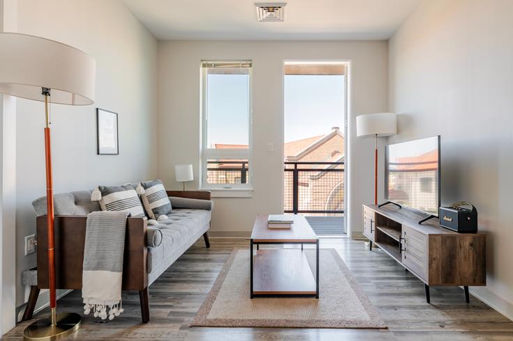 Elegantly designed living room with modern furnishings in an apartment at The overlook at st. gabriels in Boston, Boston Elegantly designed living room with modern furnishings in an apartment at The overlook at st. gabriels in Boston, Boston