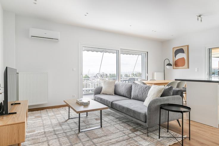 South Athens, Athens에 위치한 Poseidonos 10 아파트의 세련된 인테리어가 돋보이는 거실 South Athens, Athens에 위치한 Poseidonos 10 아파트의 세련된 인테리어가 돋보이는 거실