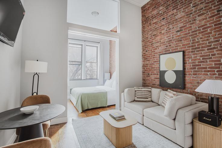 Elegantly designed living room with modern furnishings in an apartment at 234 West 14th in Manhattan, New York