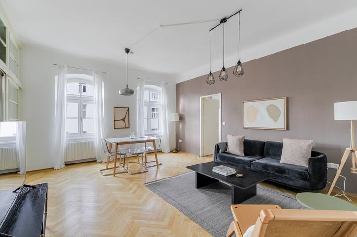 Elegante sala de estar con mobiliario moderno en un apartamento en Lazarettgasse 37 en Vienna, Vienna Elegante sala de estar con mobiliario moderno en un apartamento en Lazarettgasse 37 en Vienna, Vienna
