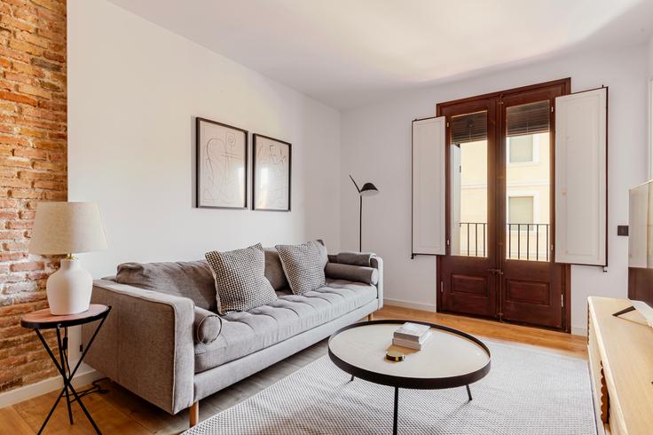 Elegantly designed living room with modern furnishings in an apartment at Notariat 8 in Ciutat Vella, Barcelona