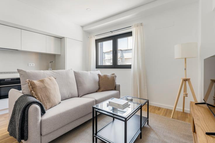 Elegantly designed living room with modern furnishings in an apartment at Avenida da República 84 in Alvalade, Lisbon Elegantly designed living room with modern furnishings in an apartment at Avenida da República 84 in Alvalade, Lisbon