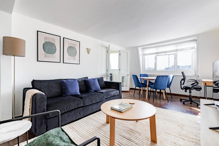 Elegantly designed living room with modern furnishings in an apartment at 26-28 Hogarth Road, London SW5 0PU in Royal Borough of Kensington and Chelsea, London Elegantly designed living room with modern furnishings in an apartment at 26-28 Hogarth Road, London SW5 0PU in Royal Borough of Kensington and Chelsea, London