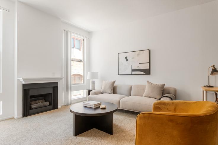 Elegantly designed living room with modern furnishings in an apartment at 435 S Detroit in Los Angeles, Los Angeles
