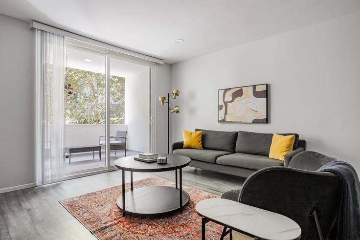 Elegantly designed living room with modern furnishings in an apartment at 1371 S Beverly Glen in Los Angeles, Los Angeles
