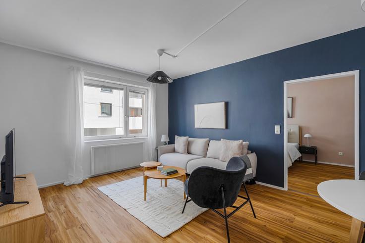 Elegant gestaltetes Wohnzimmer mit moderner Einrichtung in einer Wohnung im Clerfaytgasse 10 in Vienna, Vienna Elegant gestaltetes Wohnzimmer mit moderner Einrichtung in einer Wohnung im Clerfaytgasse 10 in Vienna, Vienna