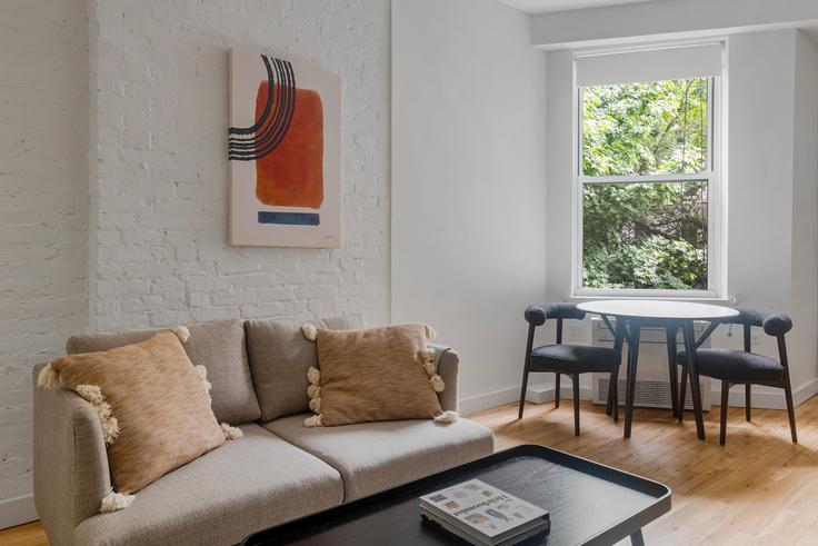 Elegantly designed living room with modern furnishings in an apartment at 324 E 77 in Manhattan, New York Elegantly designed living room with modern furnishings in an apartment at 324 E 77 in Manhattan, New York
