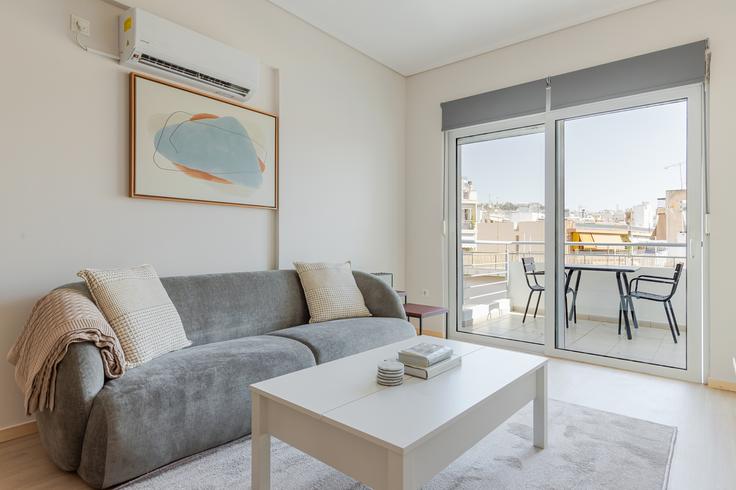 Elegantly designed living room with modern furnishings in an apartment at Larissis 65 Ampelokipoi in Central Athens, Athens Elegantly designed living room with modern furnishings in an apartment at Larissis 65 Ampelokipoi in Central Athens, Athens