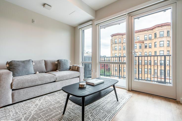 Salle de séjour élégante avec mobilier moderne dans un appartement à Novel 14 à Washington, Washington Salle de séjour élégante avec mobilier moderne dans un appartement à Novel 14 à Washington, Washington