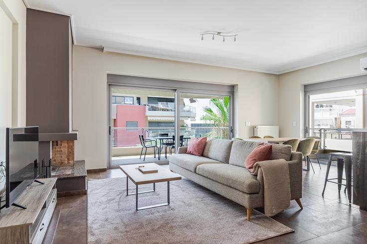 Elegantly designed living room with modern furnishings in an apartment at Epsilon in South Athens, Athens Elegantly designed living room with modern furnishings in an apartment at Epsilon in South Athens, Athens
