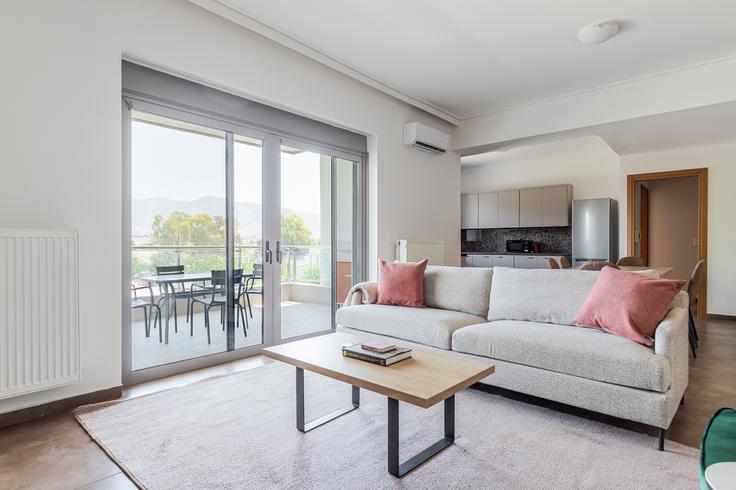 Elegantly designed living room with modern furnishings in an apartment at Epsilon in South Athens, Athens Elegantly designed living room with modern furnishings in an apartment at Epsilon in South Athens, Athens