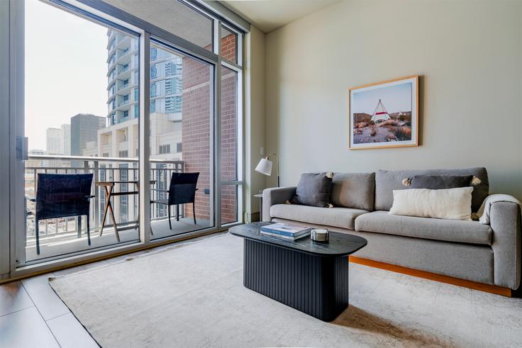 Elegantly designed living room with modern furnishings in an apartment at Ashton in Austin, Austin Elegantly designed living room with modern furnishings in an apartment at Ashton in Austin, Austin