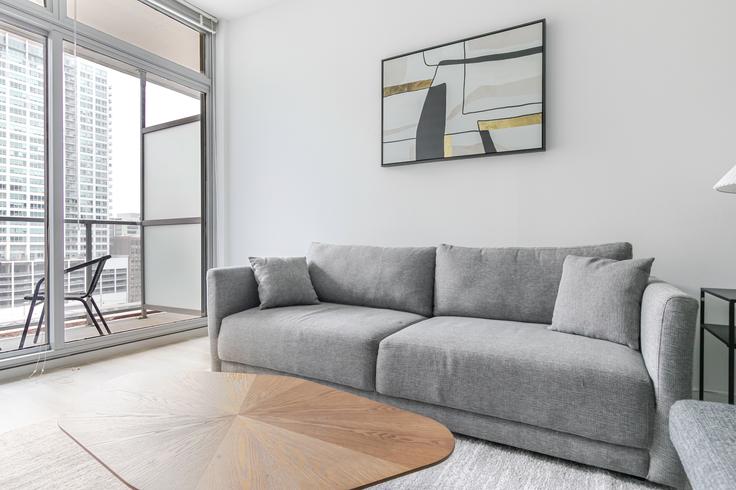 Salle de séjour élégante avec mobilier moderne dans un appartement à Burnham Pointe à Chicago, Chicago