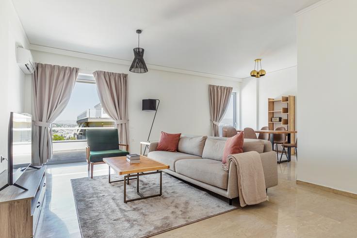 Salle de séjour élégante avec mobilier moderne dans un appartement à Polimnias 12, Cholargos à North Athens, Athens Salle de séjour élégante avec mobilier moderne dans un appartement à Polimnias 12, Cholargos à North Athens, Athens