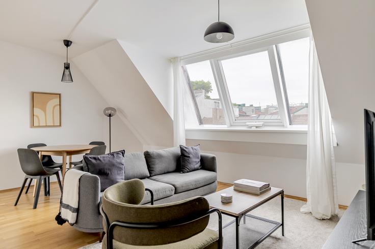 Elegantly designed living room with modern furnishings in an apartment at Theresianumgasse 4 in Vienna, Vienna Elegantly designed living room with modern furnishings in an apartment at Theresianumgasse 4 in Vienna, Vienna