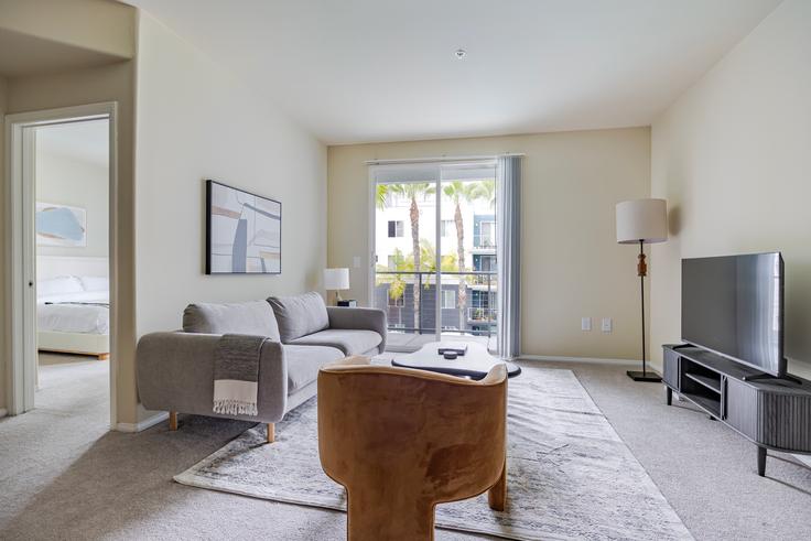 Elegantly designed living room with modern furnishings in an apartment at Avalon playa vista in Los Angeles, Los Angeles Elegantly designed living room with modern furnishings in an apartment at Avalon playa vista in Los Angeles, Los Angeles